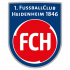 FCH_Standard_Logo_b Logo des 1. FC Heidenheim 1860: Ein blaues Wappen mit einem roten Kreis, darin die weißen Buchstaben "FCH".