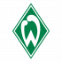Logo Werder Bremen Carsten Cramer, Dr. Reinhard Rauball und Daniela Schadt sitzen auf einer Couch auf der Bühne einer Veranstaltung. Im Hintergrund ein Banner mit der Aufschrift "Willkommen im Fußball" und dem Logo der DFL Stiftung.